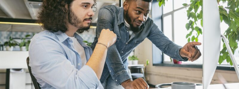 medium-shot-men-working-with-computer